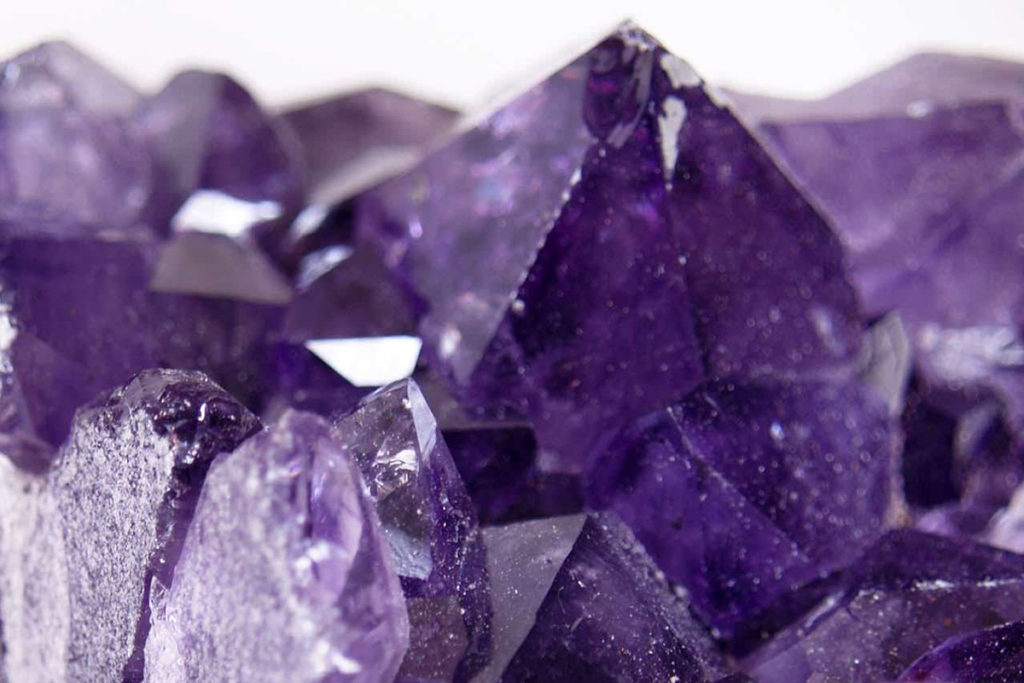 A close up of the vibrant purple amethyst stone.
